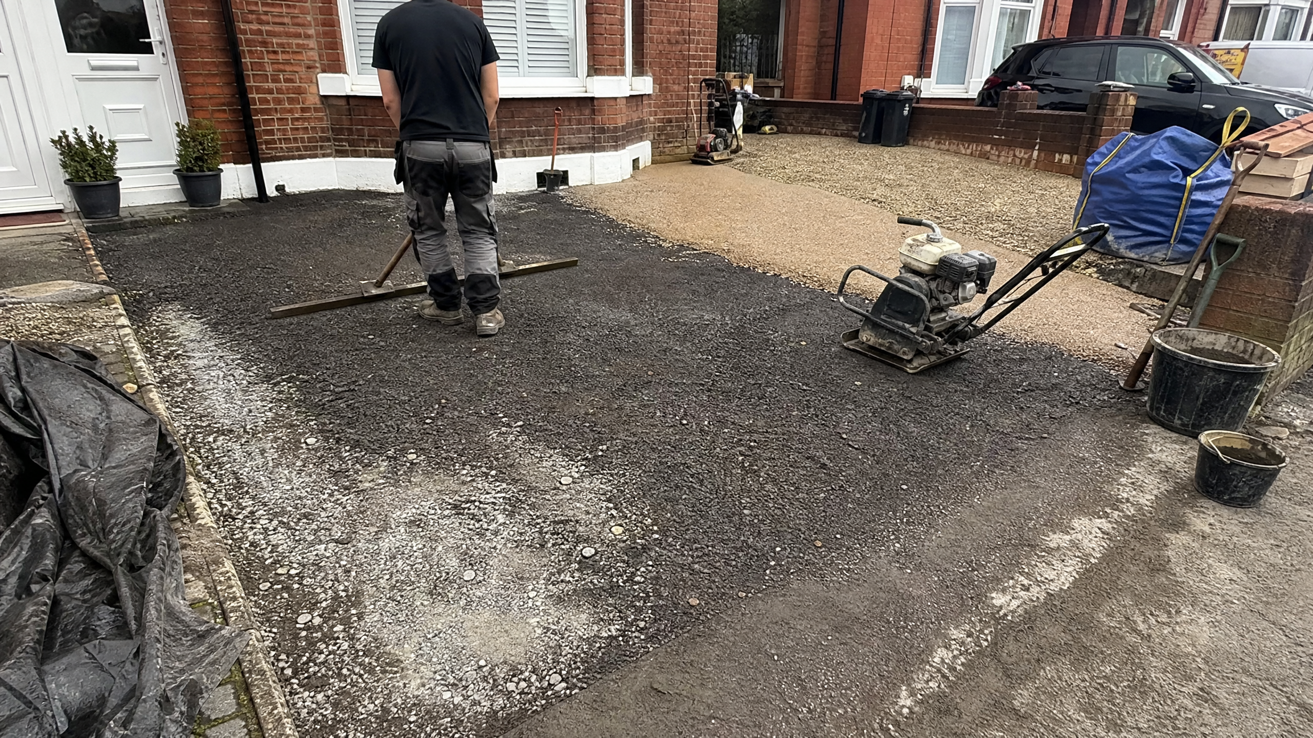 Resin Bound Driveways in progress at a British residential property — professional service in Kettering