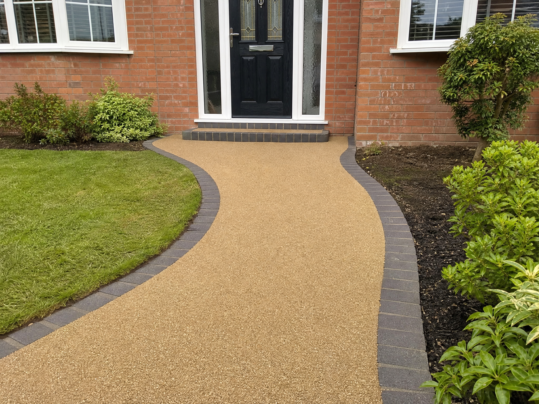 Completed resin paths showing professional quality workmanship in a British home