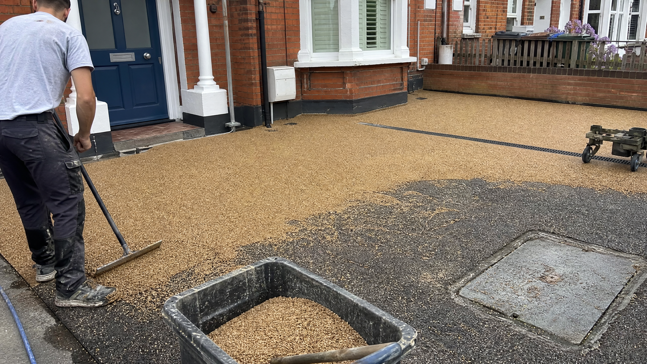 Resin Patios in progress at a British residential property — professional service in Kettering